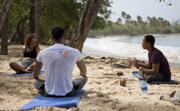 Hatha yoga on the beach