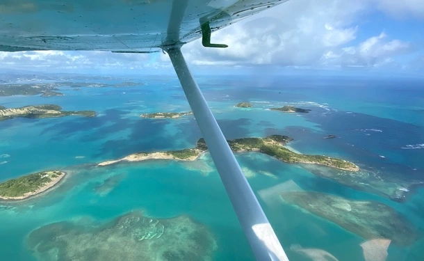 Martinique seen from the sky at the controls of a plane
