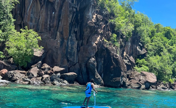 Step paddle on translucent water