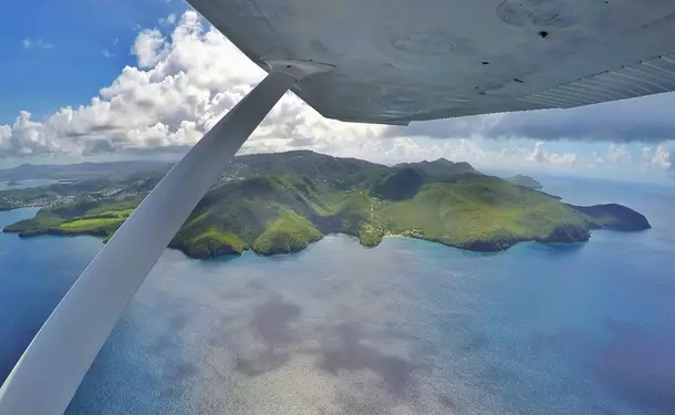 Martinique seen from the sky at the controls of a plane
