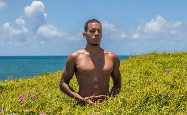 Hatha yoga on the beach